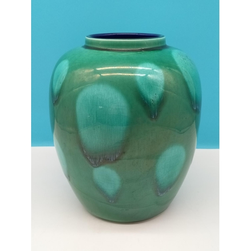 143 - Poole Pottery Green 23cm Vase.