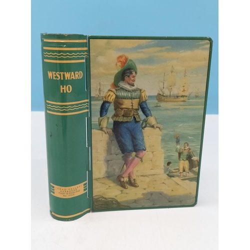 470 - Excellent Condition Chad Valley 'Westward Ho' Tin Money Box in the Shape of a Book with Key. 14.5cm ... 