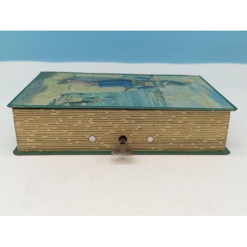 470 - Excellent Condition Chad Valley 'Westward Ho' Tin Money Box in the Shape of a Book with Key. 14.5cm ... 