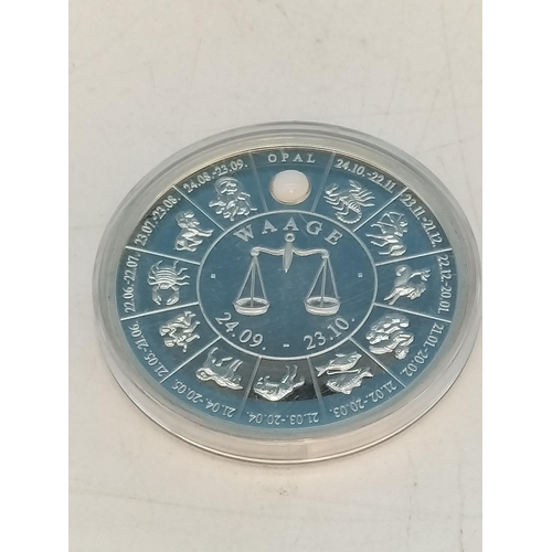 100 - Silver .900 Opal Zodiac Medal/Coin. Total Weight 53 Grams.