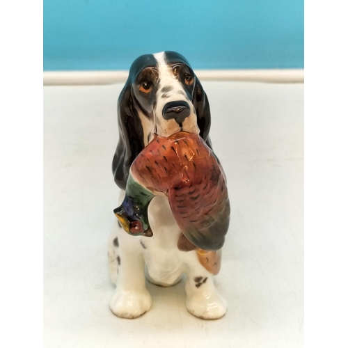 37 - Royal Doulton 14cm Figure of Spaniel with Pheasant. HN1138