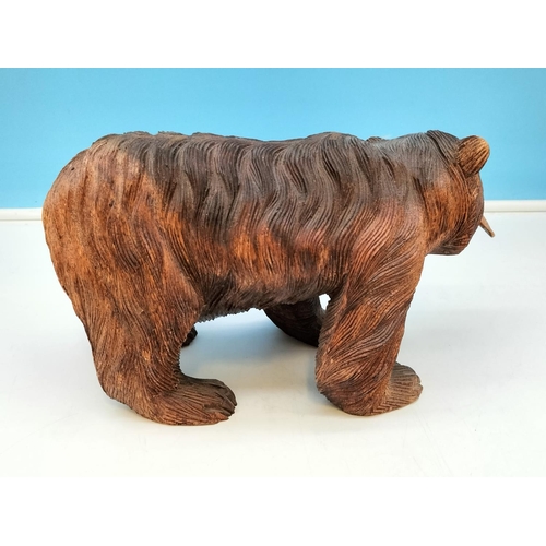 173 - Hand Carved Wooden Bear with Fish. 16cm High, 29cm x 14cm.