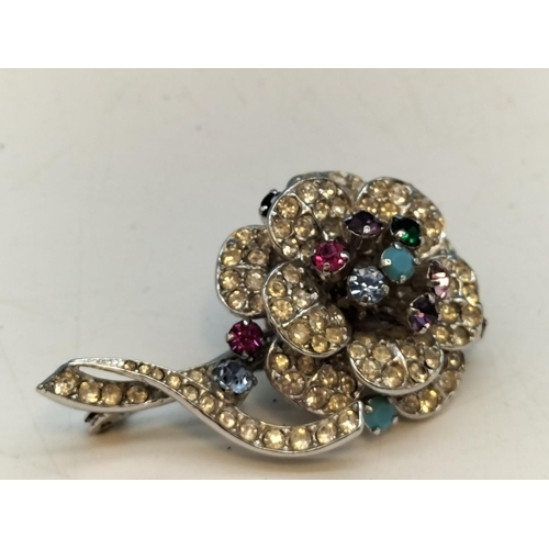 185A - Floral Brooch with Multi Coloured and Clear Stones. Stamped Austria. 5cm x 3cm.