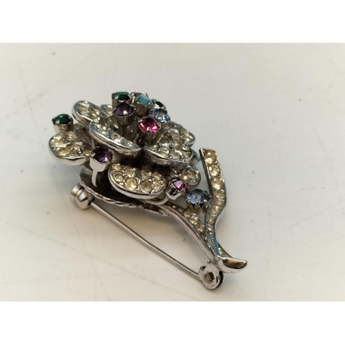 185A - Floral Brooch with Multi Coloured and Clear Stones. Stamped Austria. 5cm x 3cm.