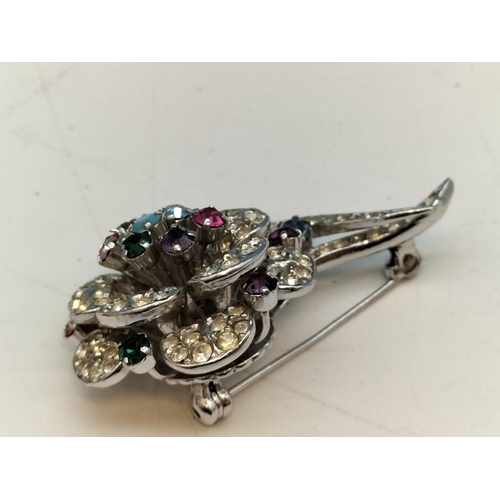 185A - Floral Brooch with Multi Coloured and Clear Stones. Stamped Austria. 5cm x 3cm.