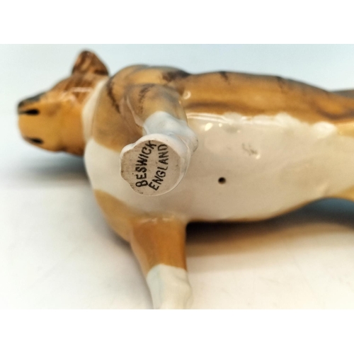 195A - Beswick Figure of a Boxer Dog. 13.5cm High, 19cm x 6cm.