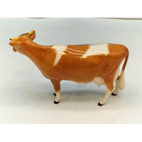 250A - Beswick figure of a Guernsey Cow. Nibble to Ear. 10cm High, 17cm x 5cm.