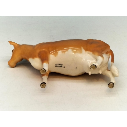 250A - Beswick figure of a Guernsey Cow. Nibble to Ear. 10cm High, 17cm x 5cm.