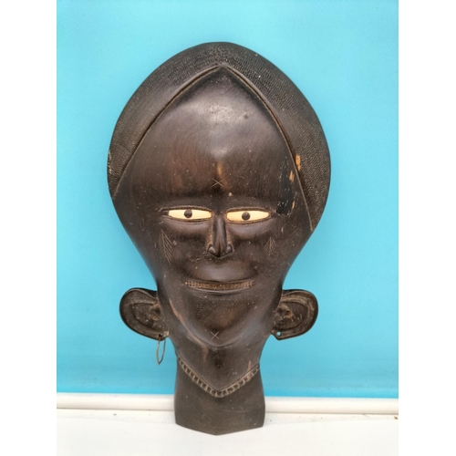 310 - African Hand Carved Mask. 31cm x 17cm x 5cm.