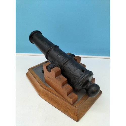 404 - Cast Metal Cannon on Wooden Stand with Cannonballs. 19cm High, 27.5cm x 17cm.