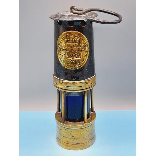 188 - Ackroyd and Best Ltd Miners Lamp with Blue Tinted Glass No 153. 25cm Tall.