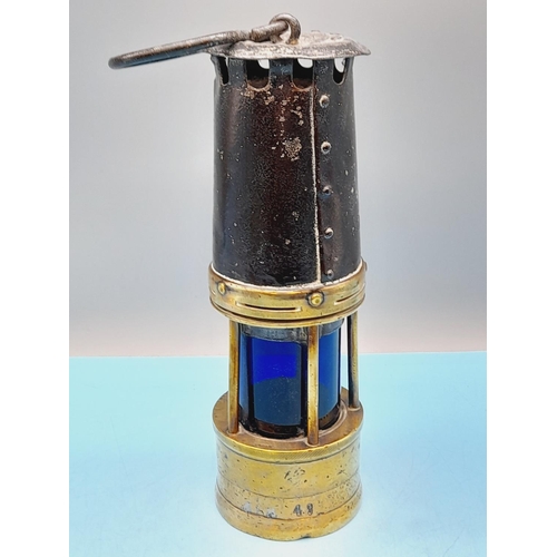 188 - Ackroyd and Best Ltd Miners Lamp with Blue Tinted Glass No 153. 25cm Tall.