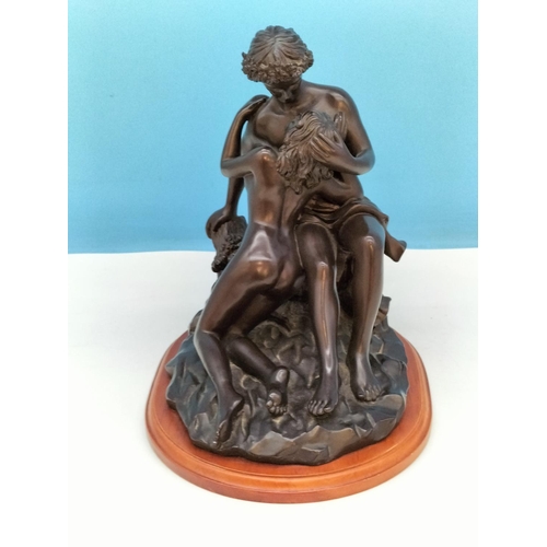 225 - Bronze Effect Resin 'Lovers Embrace' Figure on Plinth. 27cm High, 24cm x 20cm.