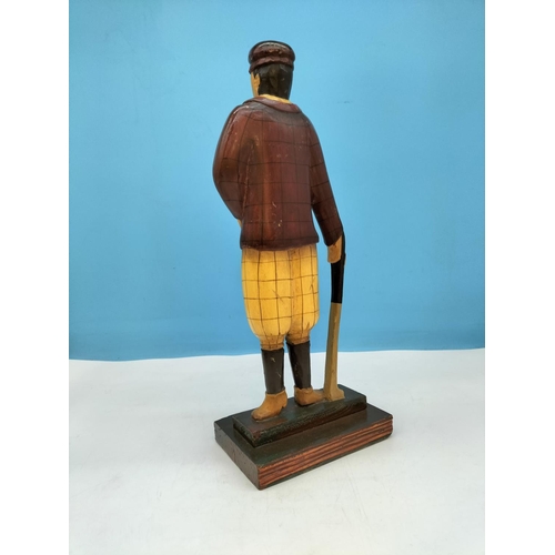 228 - Wooden 40cm Figure of a Cricket Player plus Pair of Wooden 14cm Candlesticks.