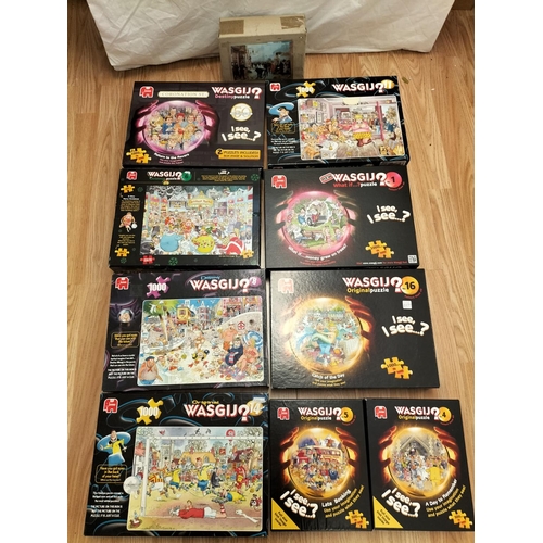 285A - Wasgij Puzzles (9) plus One Other. Vendors Description - Open but Complete.