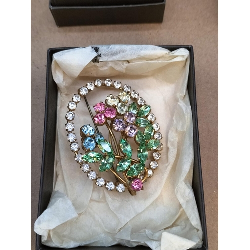 293 - Collection of Boxed Good Condition Coloured Costume Brooches and Green Bead Necklace.