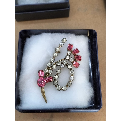 293 - Collection of Boxed Good Condition Coloured Costume Brooches and Green Bead Necklace.