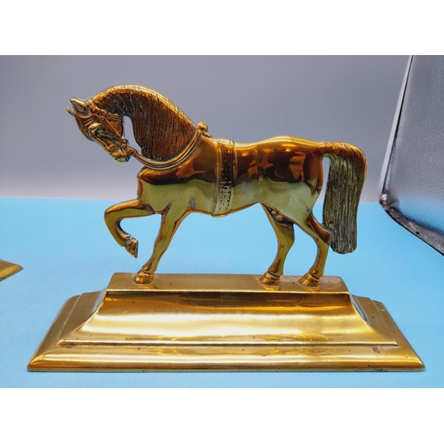 58 - Pair of 19th Century Brass Fireside Horses. 17cm High x 24cm.