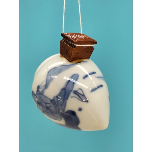 275A - Chinese Blue and White Garden Scene Bird Feeder. 7cm x 8cm.