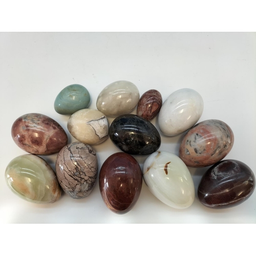 47 - Collection of Polished Onyx and Marble Eggs in a 20cm Bowl.