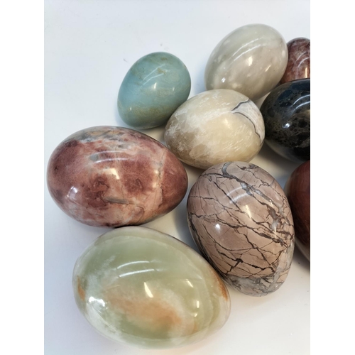 47 - Collection of Polished Onyx and Marble Eggs in a 20cm Bowl.