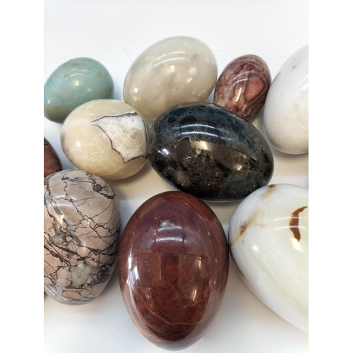 47 - Collection of Polished Onyx and Marble Eggs in a 20cm Bowl.