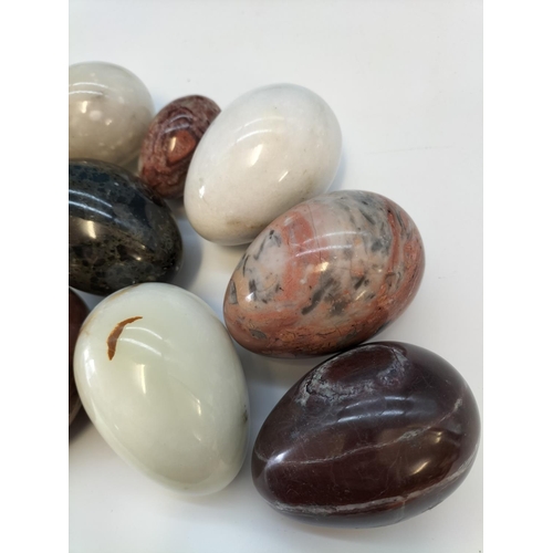 47 - Collection of Polished Onyx and Marble Eggs in a 20cm Bowl.