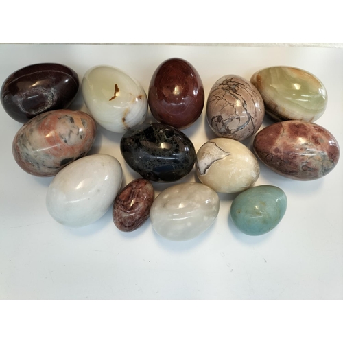 47 - Collection of Polished Onyx and Marble Eggs in a 20cm Bowl.