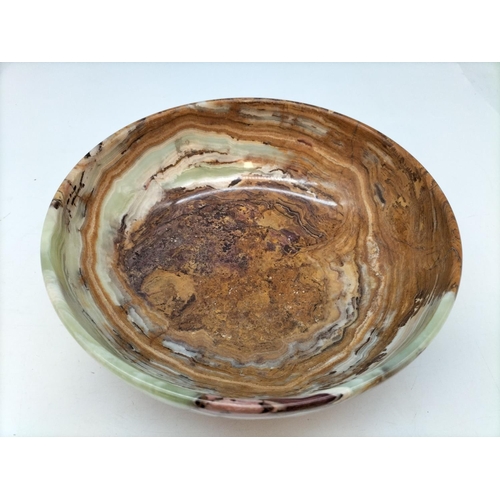 47 - Collection of Polished Onyx and Marble Eggs in a 20cm Bowl.