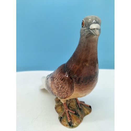 11 - Beswick Figure of a Pigeon 1383. 15cm High, 16cm x 7cm Repair to Wing.