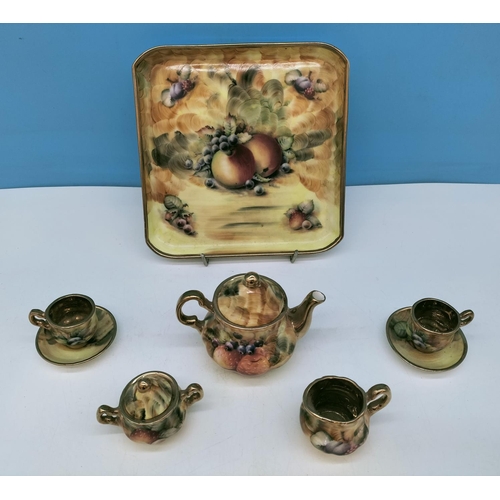 129 - Hose Street Pottery Miniature Tea for Two Set in a Floral Pattern.