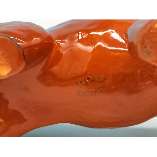 141 - Beswick Figure of a Fox. 14cm High x 24cm.