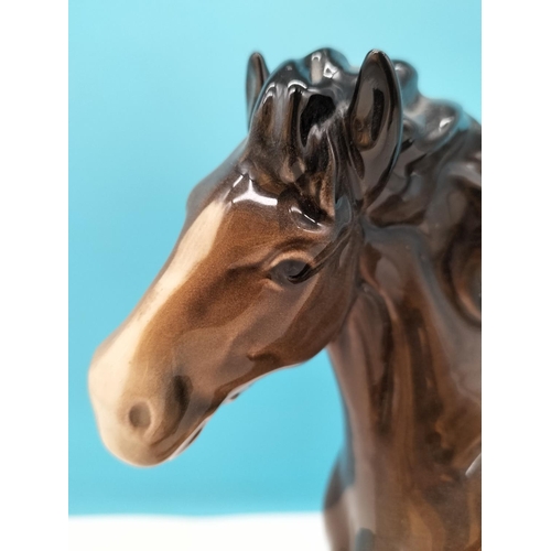 176 - Beswick Figure of a Cantering Shire Horse. 22cm High x 26cm.