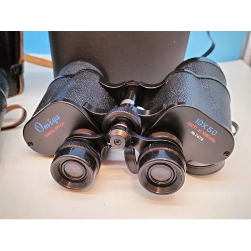 199 - 2 Pairs of Binoculars in Cases, Omiya 10 x 50 and Tecnar by Swift 7 x 50.