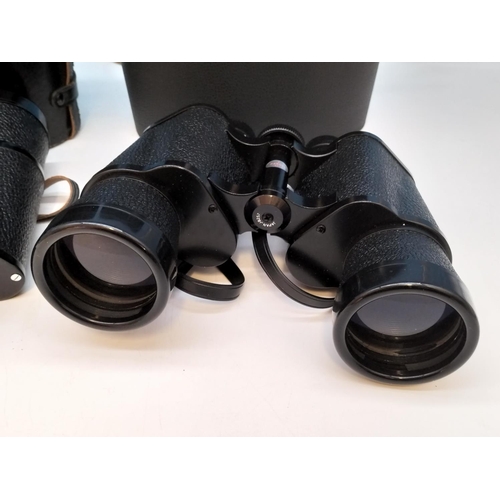 199 - 2 Pairs of Binoculars in Cases, Omiya 10 x 50 and Tecnar by Swift 7 x 50.