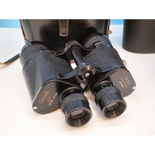 199 - 2 Pairs of Binoculars in Cases, Omiya 10 x 50 and Tecnar by Swift 7 x 50.