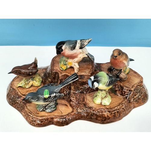 42 - Beswick Bird Figures (5) on Stand 32cm x 19cm x 6cm. A/F Chip to Front of Base of Stand.