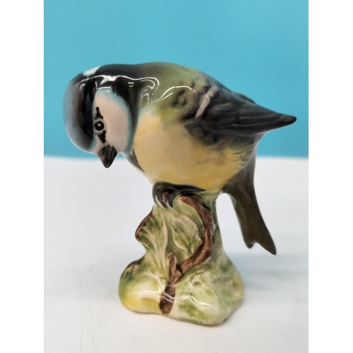 42 - Beswick Bird Figures (5) on Stand 32cm x 19cm x 6cm. A/F Chip to Front of Base of Stand.