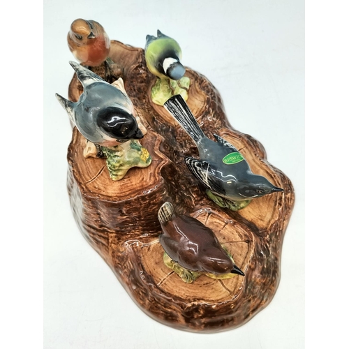 42 - Beswick Bird Figures (5) on Stand 32cm x 19cm x 6cm. A/F Chip to Front of Base of Stand.