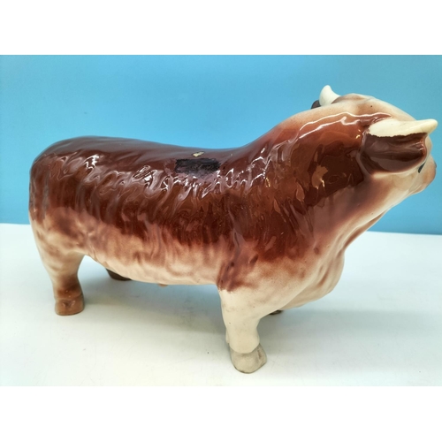 434 - Butchers Shop Display Bull Figure. Paint Flake and Repaint to Body. 19cm High, 31cm x 11cm.