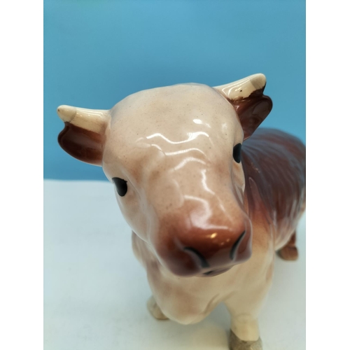 434 - Butchers Shop Display Bull Figure. Paint Flake and Repaint to Body. 19cm High, 31cm x 11cm.