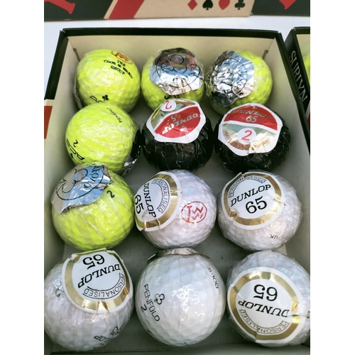 521 - 2 Boxes (12 in Each) New Golf Balls to include Penfold Lunar Yellow and Dunlop 65.