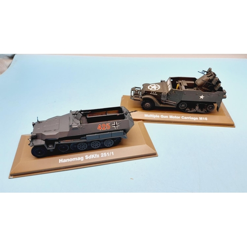 528 - Cased Army Vehicles (2), 'Hanomag SdKfz 251/1' and 'Multiple Gun Motor Carriage M16'. One Case Crack... 