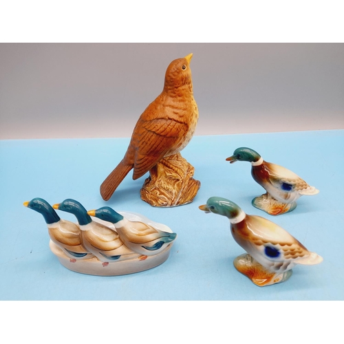 569 - Beswick Duck Figures (3) plus Beswick Matt Song Thrush Figure. Tallest 15cm.