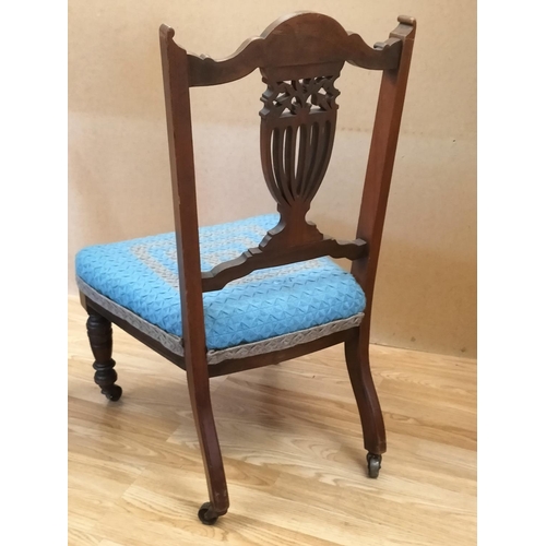 588 - Carved Oak Shield Back Nursing Chair on Castors plus Oak Framed Tapestry Fire Screen. Chair measures... 