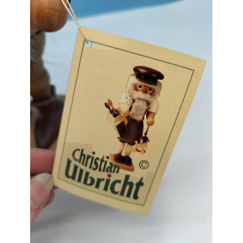 63 - German Wooden Figures (2) to include The Miner by Christian Ulbricht and Nutcracker by Neiman Marcus... 