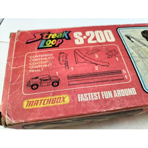 67 - Boxed Matchbox S-200 Streak Loop Set with 1 Car. Box Has Signs of Wear.