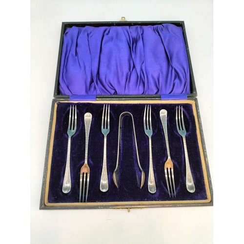 247 - Set of 6 Pastry Forks and Sugar Tongs in Spoon case plus Chrome Boat Cruet Set. 21cm Long.