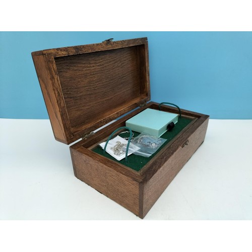 277 - Oak Jewellery Box with Contents to include Rolled Gold Strap. Box 10cm High, 25cm x 14cm.