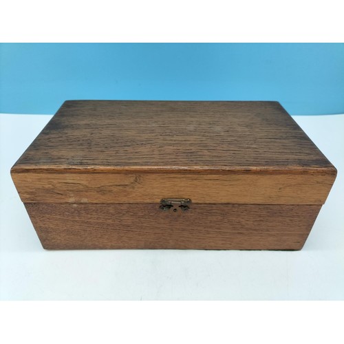 277 - Oak Jewellery Box with Contents to include Rolled Gold Strap. Box 10cm High, 25cm x 14cm.